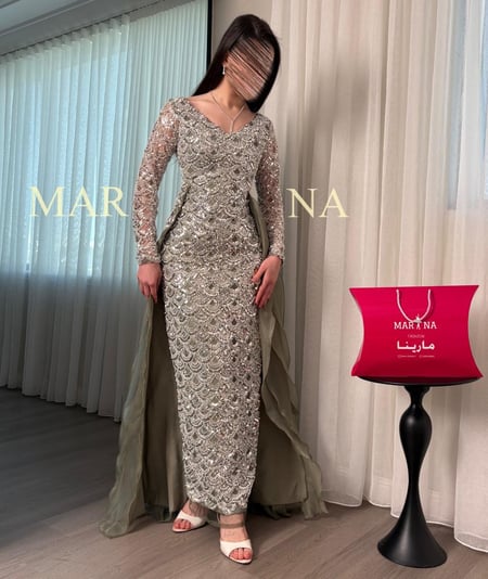 فستان بسمه (فستان زيتي شك سهره وذيل جزار )