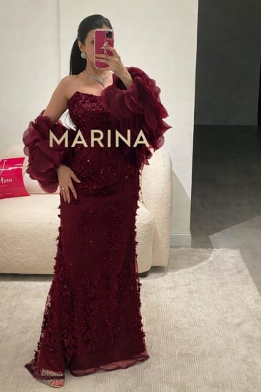 فستان روز العودي (فستان عودي كلفه مورد وشك وجاكت قص ليزر)