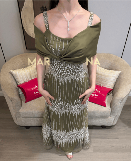 فستان نانسي زيتي (فستان زيتي كلفه شك سهره فنيكه صدريه باربي)