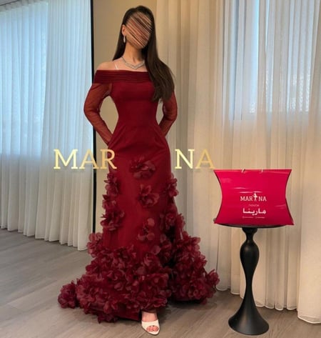 فستان  فريحه العودي  (عودي باربي وتل تيواني ورود قص ليزر )