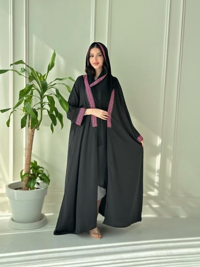 Pink with black abaya