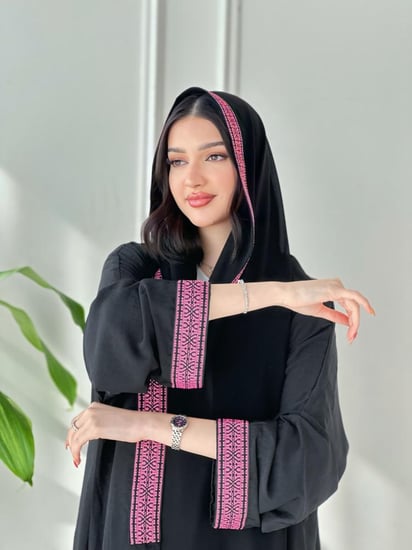 Pink with black abaya