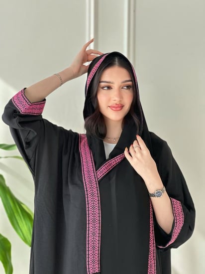 Pink with black abaya