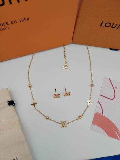 طقم لويس فيتون ذهبي