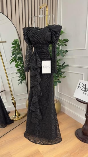 فستان أسود يطيل شكل القوام