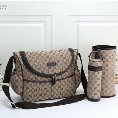 شنطة قوتشي للمواليد