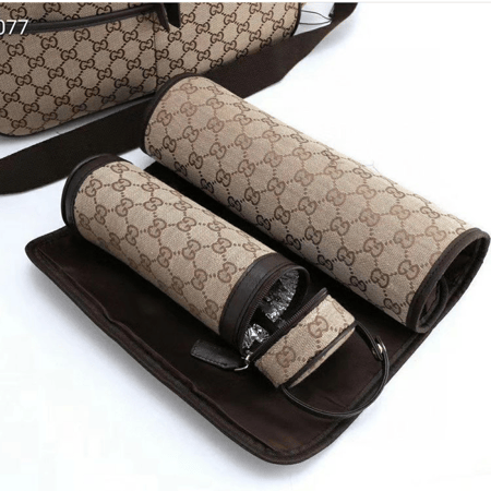 شنطة قوتشي للمواليد