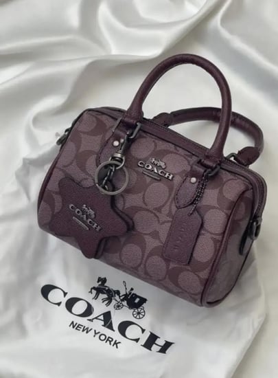 شنطة  coach عنابي