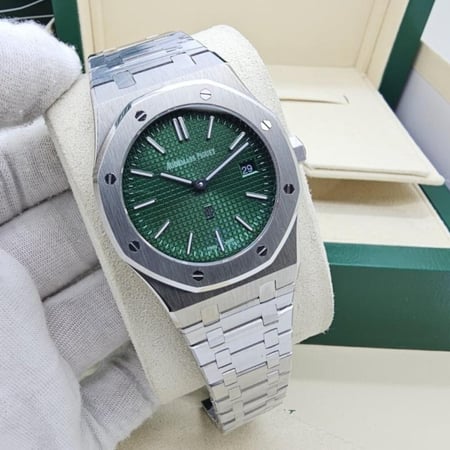 ساعة اوديمار بيجيه رجالي فضي مينا أخضر