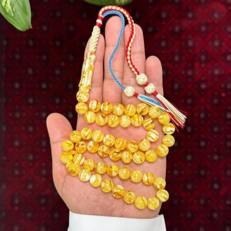 مسباح بكلايت محاكي للكهرمان