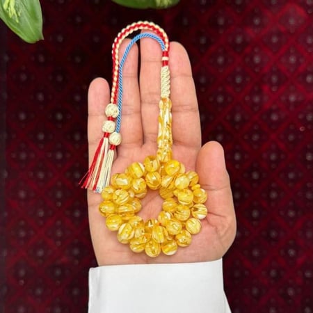 مسباح بكلايت محاكي للكهرمان