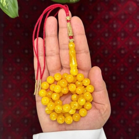 مسباح بكلايت محاكي للكهرمان