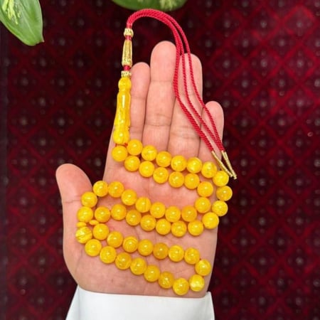مسباح بكلايت محاكي للكهرمان