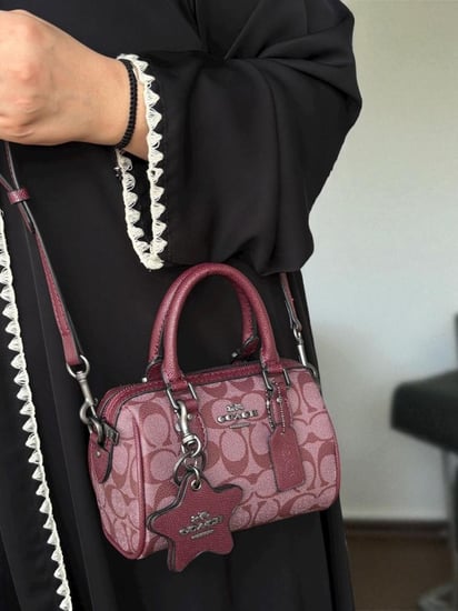 حقيبة كوتش عنابي