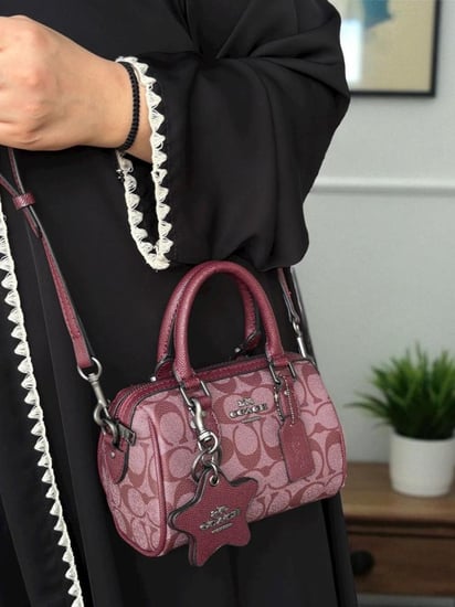 حقيبة كوتش عنابي