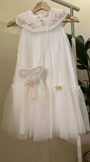 فستان من التل الناعم ب لياقه مطرزه مع شنطه مطرزه