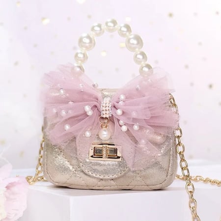 شنطة ذهبي مع وردي