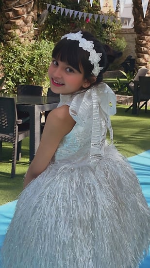 فستان الريش الابيض والفضي