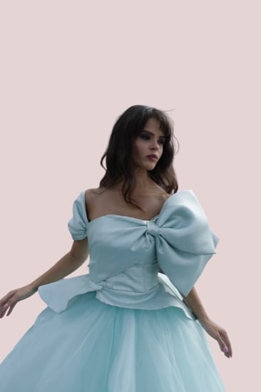 فستان سهرة منفوش تفني فيونكة جاكار وتل