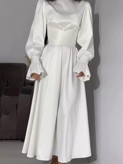 فستان ناعم بأكمام طويله مع كشكشه