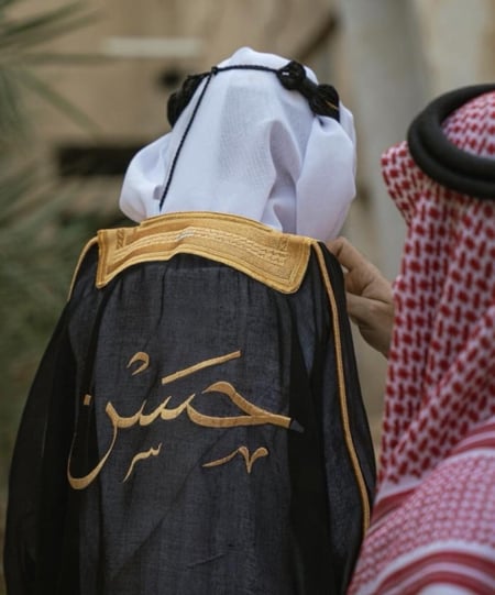 بشت أطفال اسود بالاسم