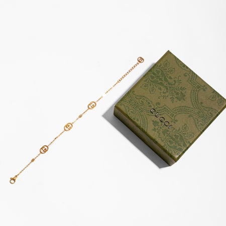 اسوارة قوتشي ذهبي