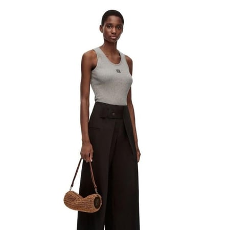 بلوزة بدون أكمام من مزيج القطن ومطرزة بنقش لويفي