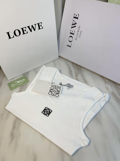 بلوزة بدون أكمام من مزيج القطن ومطرزة بنقش لويفي