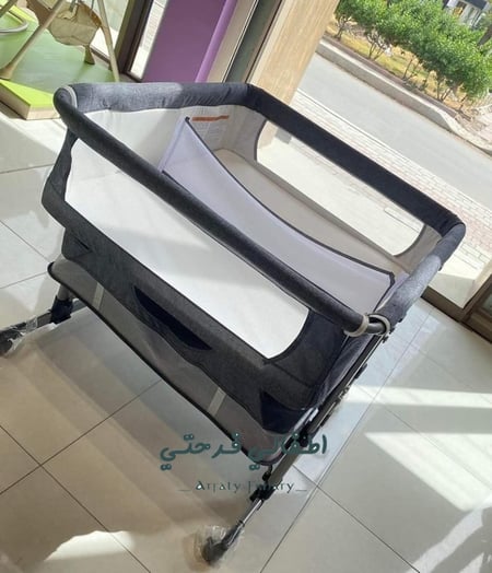 سرير اطفال للتوائم يثبت بجانب السرير