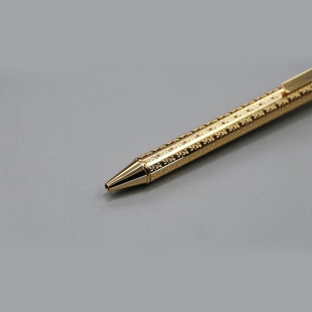 قلم لوسو ذهبي مزخرف