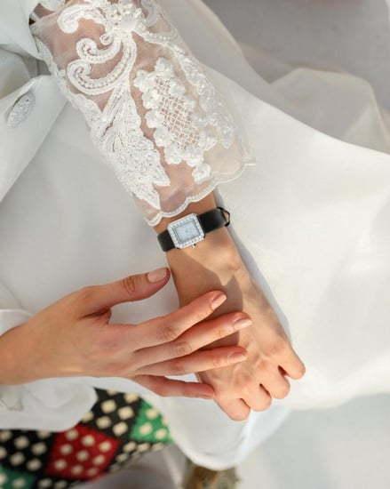 ‎ ساعة وِبل النسائية بمينا مربع من الجلد باللون الأسود