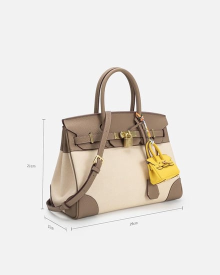 شنطة نسائية واسعة بلون بني فاتح وبيج