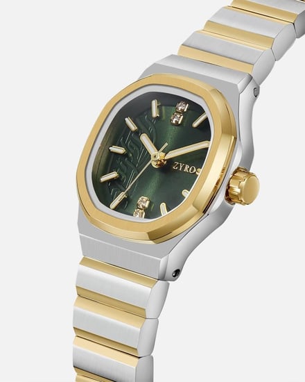 ‎ ساعة نسائية بسير ستيل بلون فضي وذهبي