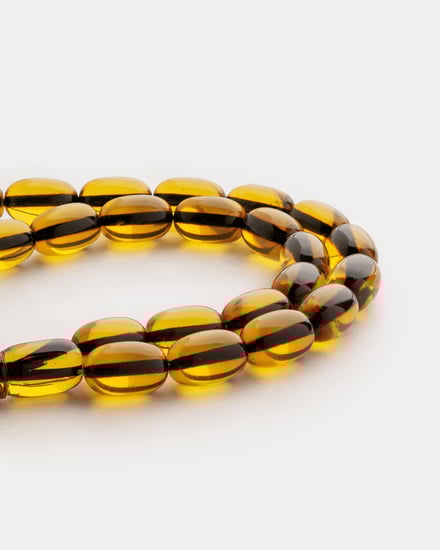 سبحة من حجر البكلايت باللون الأصفر