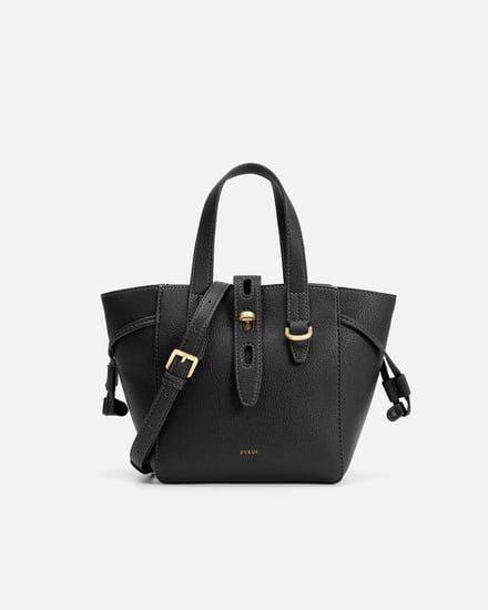 شنطة بحجم صغير ومناسب باللون الأسود