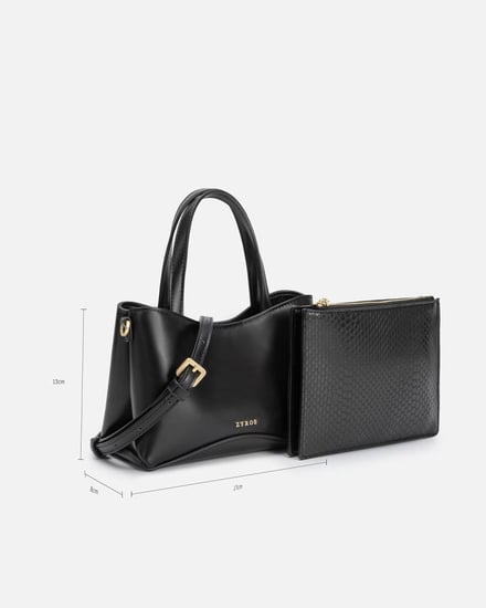 شنطة نسائية تعبر عن الجمال بلون أسود