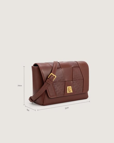 شنطة وهج بلون بني بحجم متوسط لكل يوم.