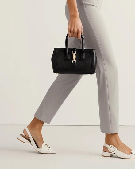 شنطة نسائية لإطلالتك العملية بلون أسود