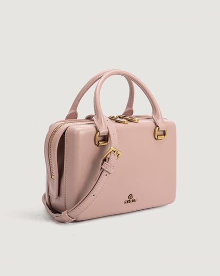 شنطة نسائية بتصميم أنيق بلون وردي