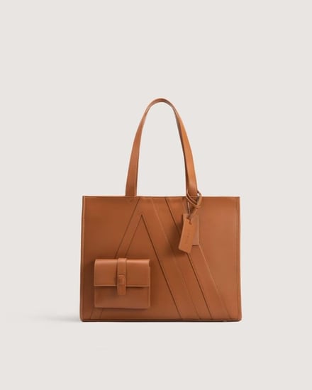 ‎ شنطة نسائية بحجم واسع باللون البني