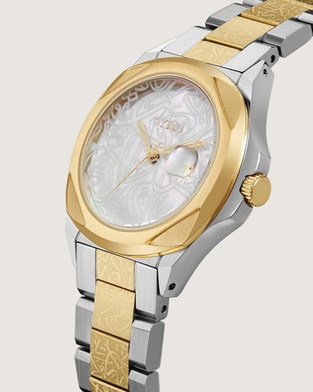 ساعة نقش النسائية بزخارف عربية بلون ذهبي وفضي