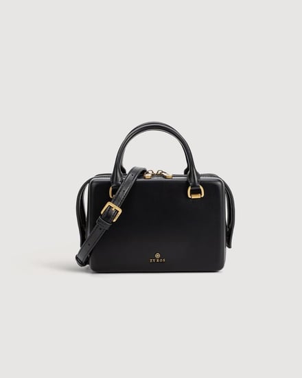 شنطة نسائية بتصميم أنيق بلون أسود