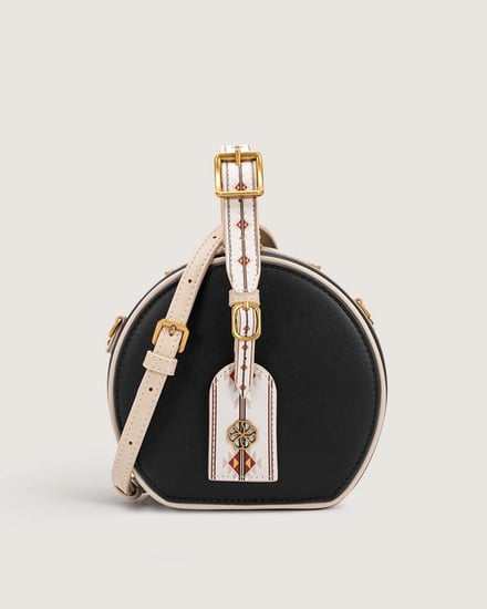 شنطة نسائية ميني دائري بلون أسود