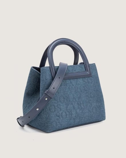 شنطة نسائية من القماش الجينز بلون أزرق