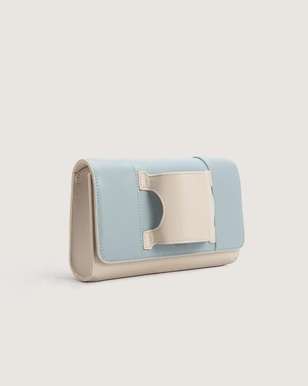 شنطة يد نسائية من الجلد بلون أزرق وبيج
