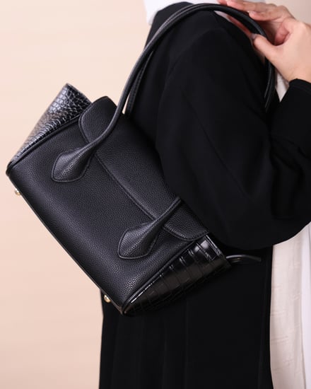 شنطة أناقة النسائية جلد بلون أسود
