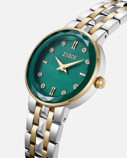 ‎ ساعة نسائية بسير ستيل بلون فضي وذهبي