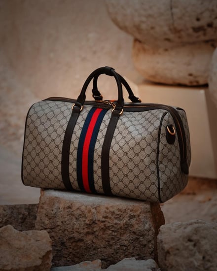 ‎ طقم شنطتين تناسب الجنسين من الجلد بلون بني