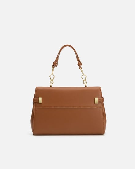 شنطة نسائية بلمسة من الفن بلون بني