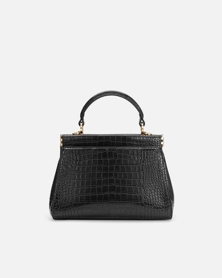 شنطة نسائية بحجم لكل يوم بلون أسود